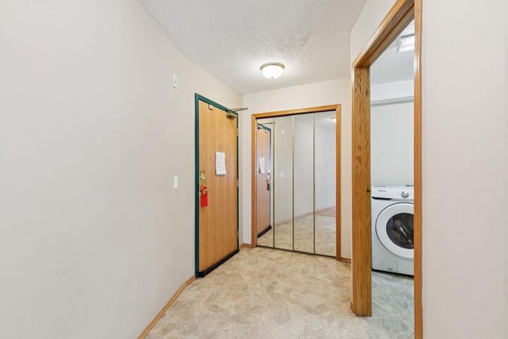 Property Photo:  7239 Sierra Morena Boulevard SW 107  AB T3H 3L7 