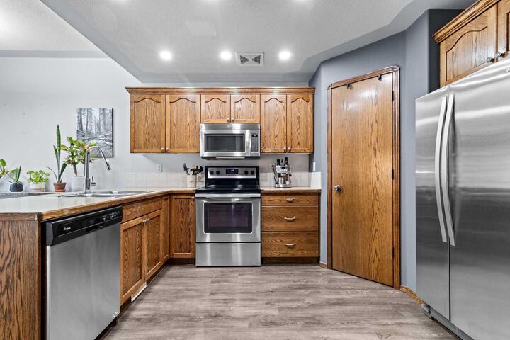 Property Photo:  303 Addington Drive  AB T4R 3H7 