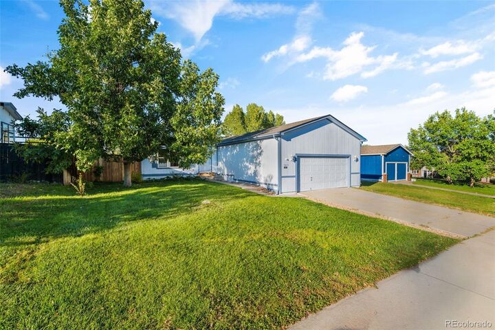 Property Photo:  5873 S Quemoy Circle  CO 80015 