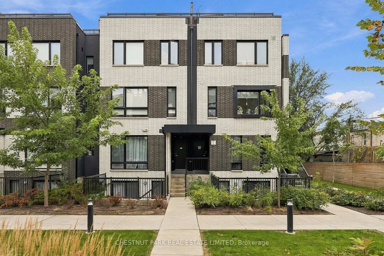 Property Photo: 20 Ed Clark Gardens Th12 ON M6N 0B5