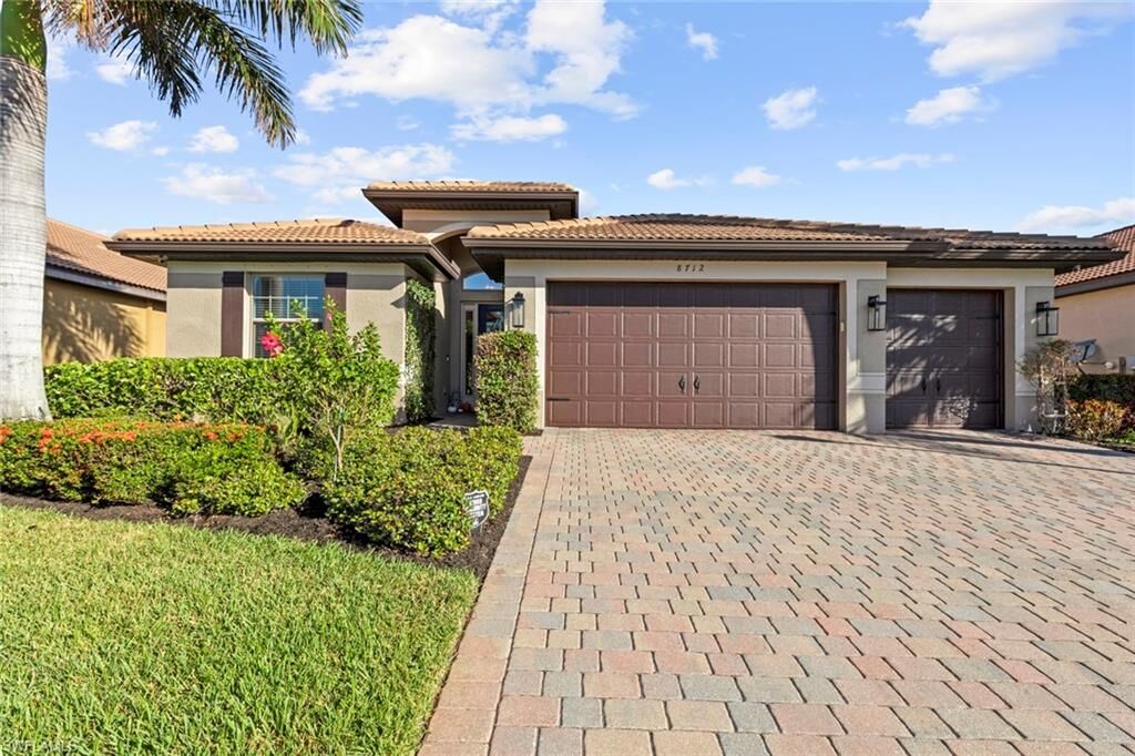 Property Photo:  8712 Westwood Oaks Pl  FL 33908 
