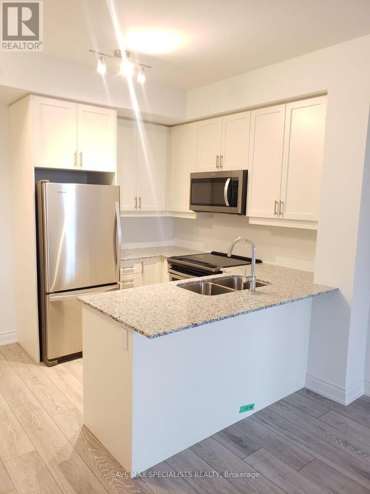 Property Photo:  1050 Main Street 401  ON L9T 9M3 