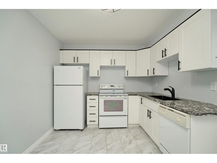 Property Photo:  1679 Lakewood Rd S NW  AB T6K 3B9 
