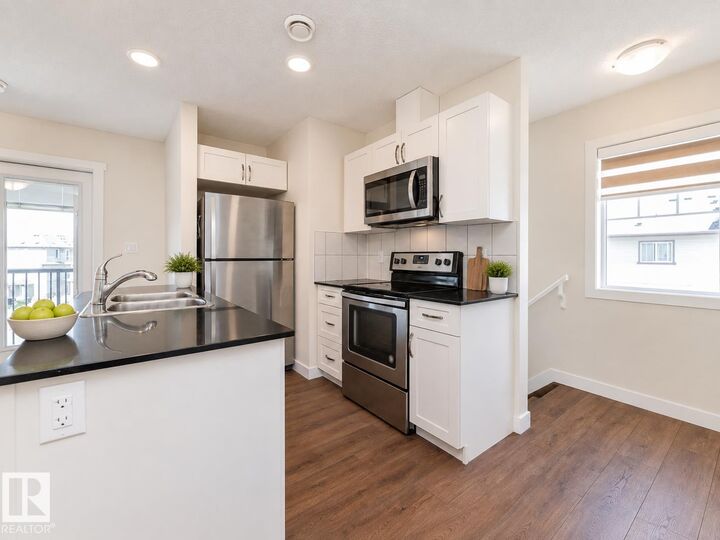 Property Photo:  1530 Tamarack Boulevard NW 81  AB T6T 2E6 
