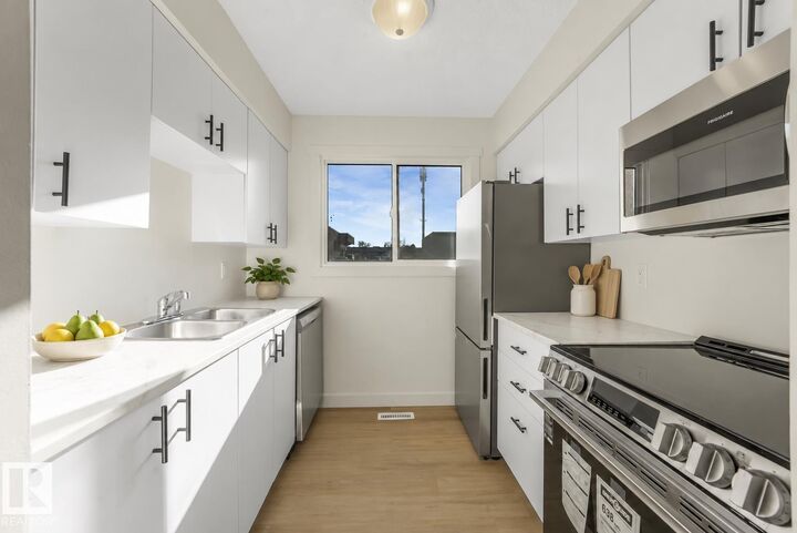 Property Photo:  5833 Riverbend Road NW  AB T6H 5A8 