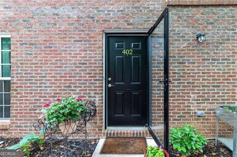 Property Photo:  1166 Booth Road SW 402  GA 30008 