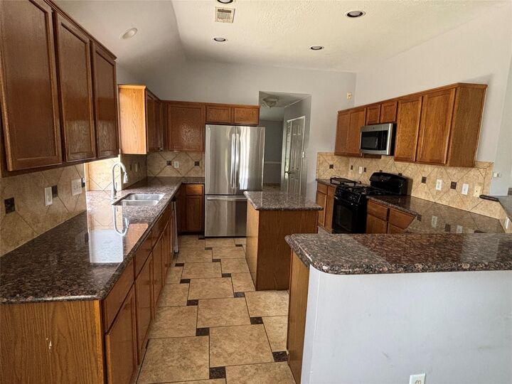 Property Photo: 14310 Cypress Green Drive TX 77429