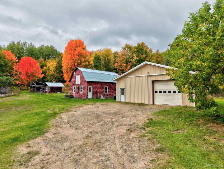 Property Photo:  54499 Cemetery Road  MI 49913 
