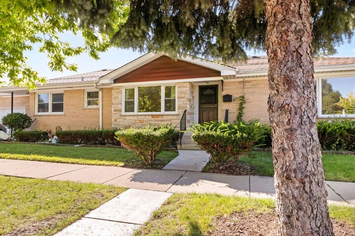 Property Photo:  5701 W Henderson Street  IL 60634 