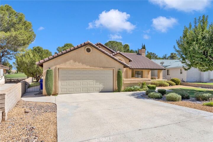 Property Photo:  15001 Blue Grass  CA 92342 