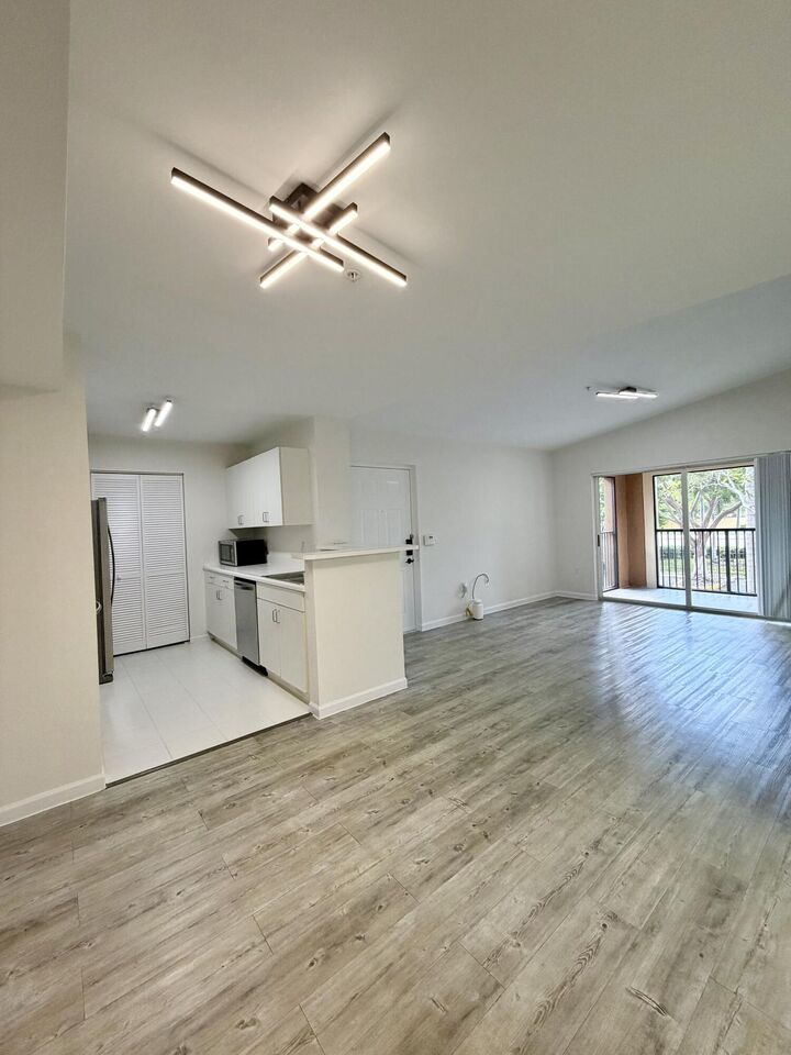 Property Photo:  4852 N State Road 7 207  FL 33073 