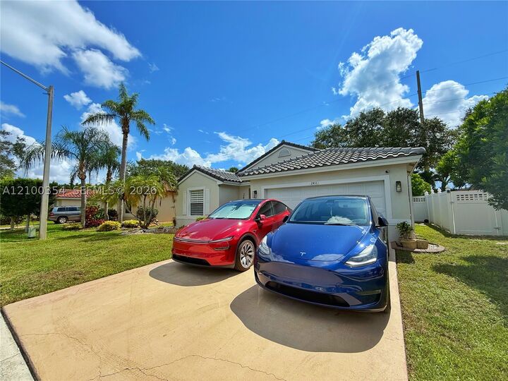 Property Photo:  2411 NW 184th Ter  FL 33029 