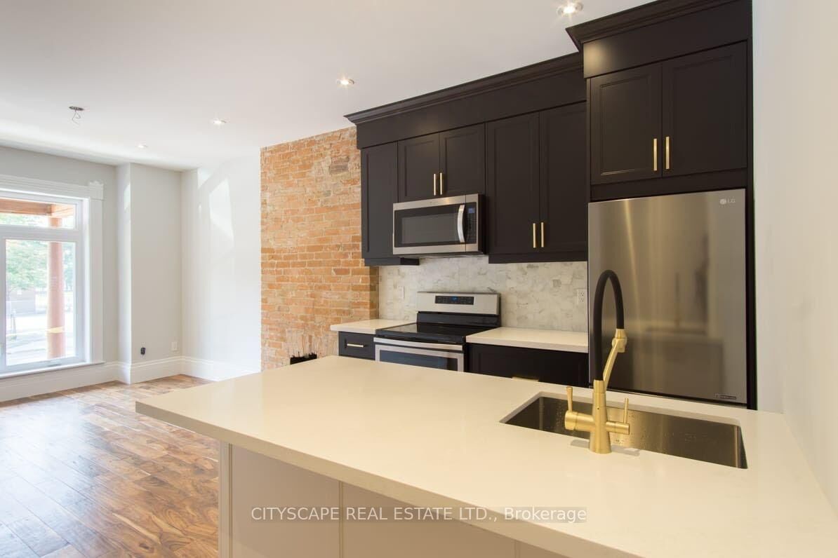 Property Photo:  936 Dundas Street E Main  ON M4M 1R3 
