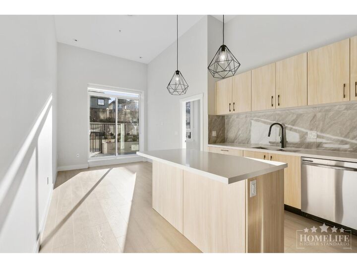 Property Photo:  14858 60 Avenue 103  BC V3S 0B5 