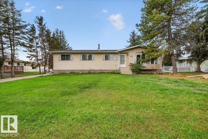 Property Photo:  5210 49 Street  AB T0A 3P0 