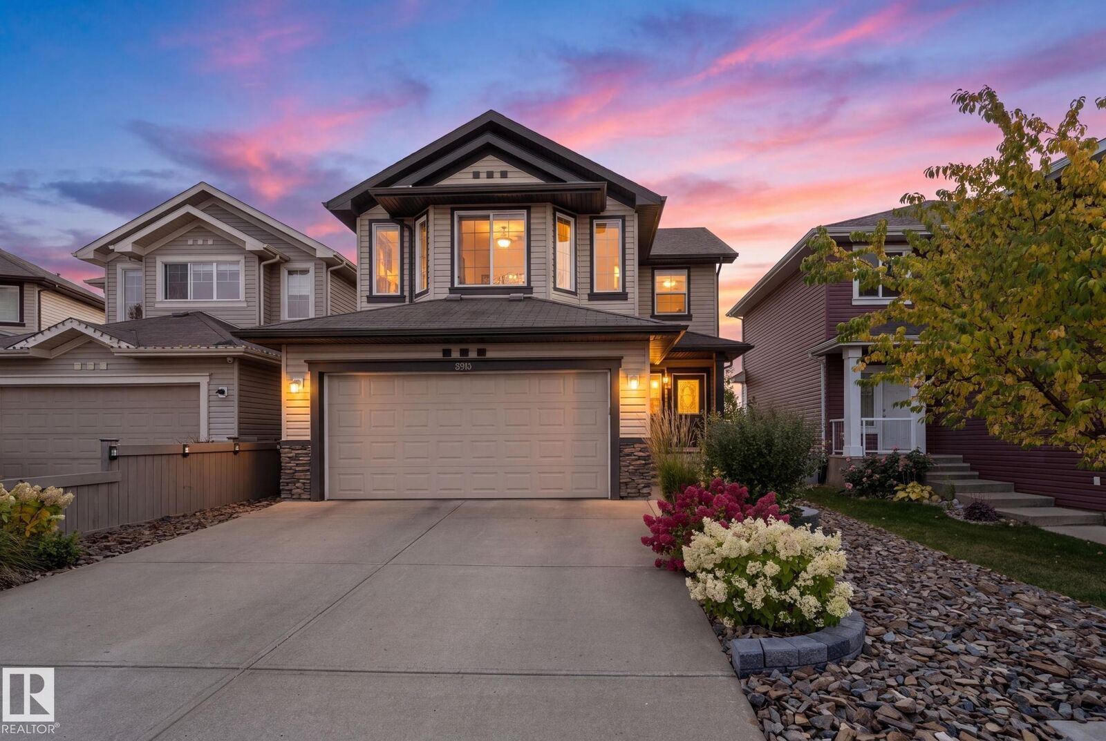 Property Photo:  5915 6 Avenue SW  AB T6X 0G4 