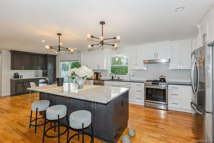 Property Photo:  1402 Merrick Avenue  NY 11566 
