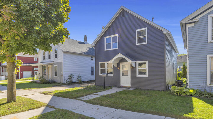Property Photo:  303 Wisconsin Ave  WI 53081 