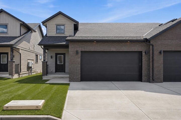 Property Photo:  15 Coopersfield Link SW 1600  AB T4B 5P5 