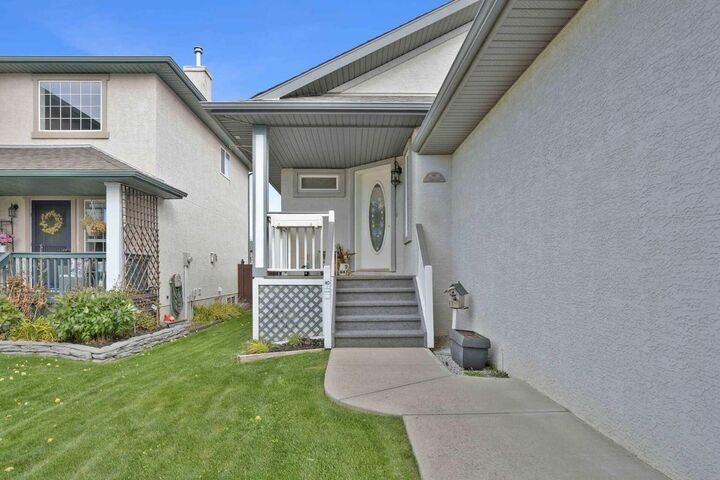 Property Photo:  164 Sunterra Heights  AB T4C 1W7 