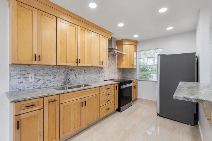 Property Photo: 100 Lake Rebecca Drive FL 33411