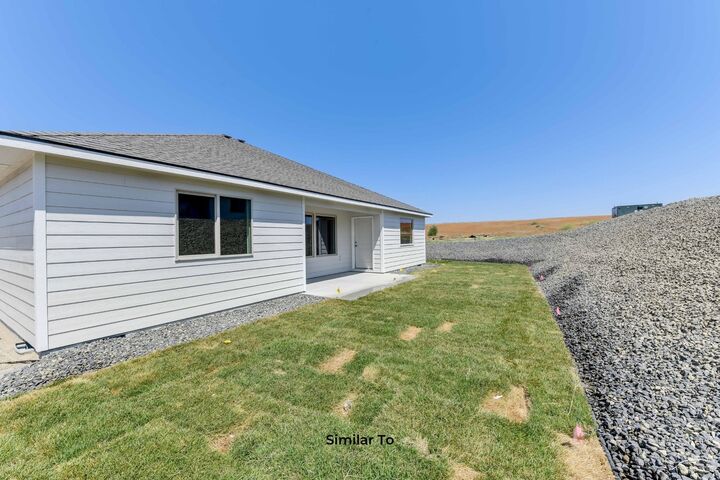 Property Photo: 1421 N High Desert Dr WA 99006