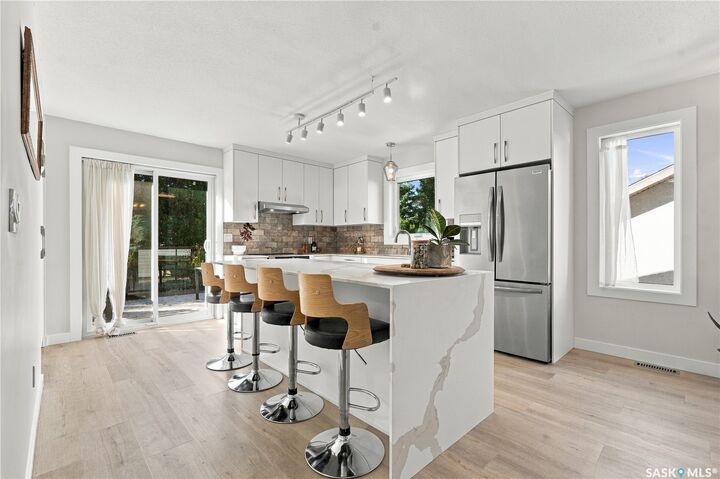Property Photo:  210 Coben Crescent  SK S7S 1B3 