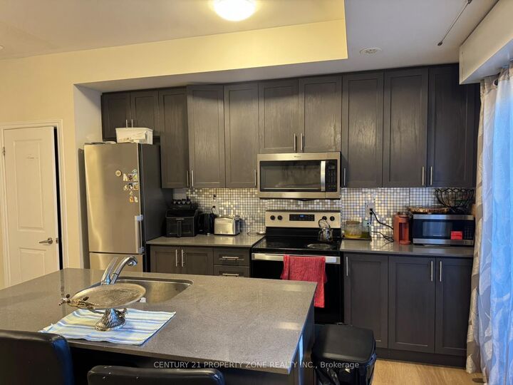 Property Photo:  485 Beresford Path 10  ON L1H 0B2 