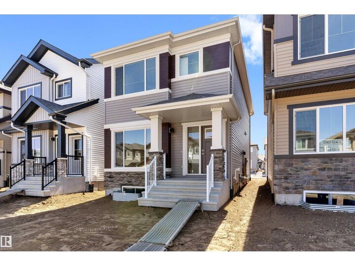 Property Photo:  20703 43 Av NW  AB T6M 3E3 