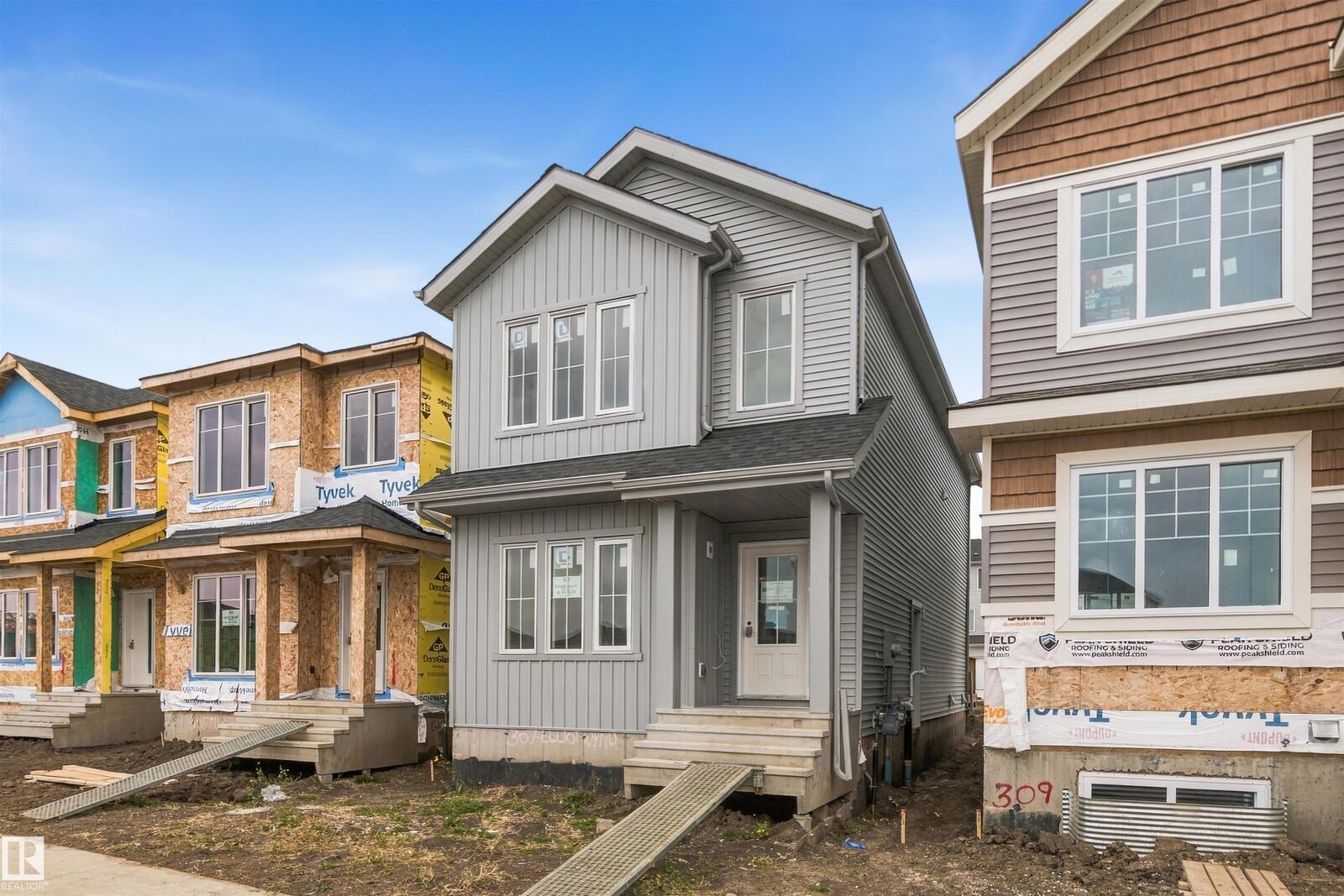 Property Photo:  307 Elliott Wynd  AB T8L 3X6 