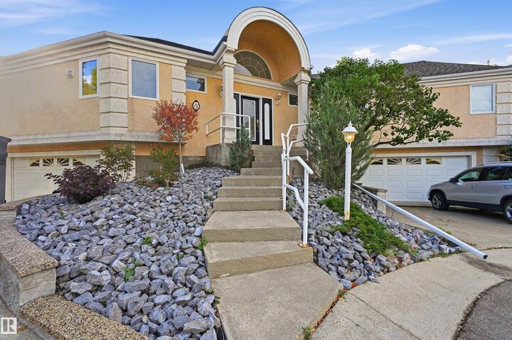 Property Photo:  11809 9B Avenue NW 5  AB T6J 7B6 