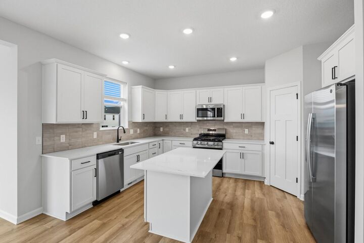 Property Photo:  11627 16th Circle NE  MN 55376 