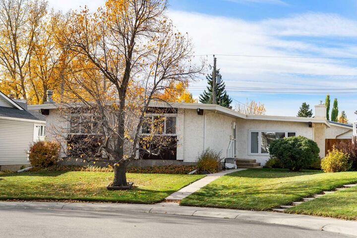 Property Photo:  6807 Silverdale Road NW  AB T3B 3N3 
