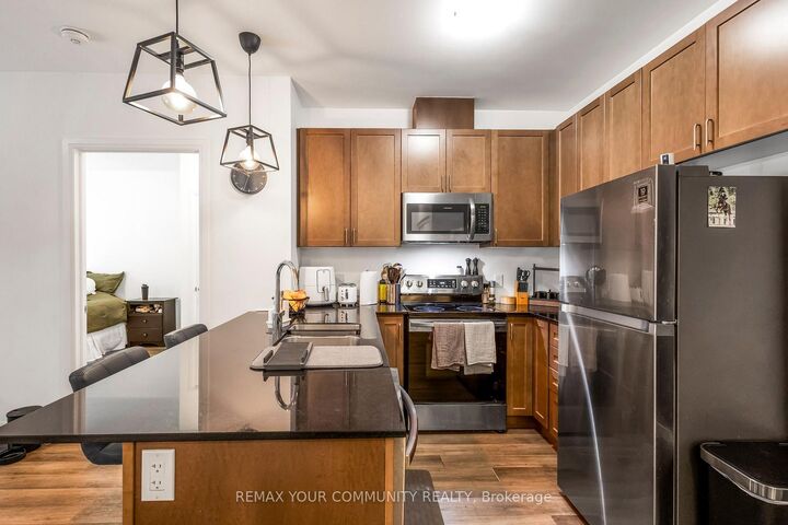 Property Photo: 102 Grovewood Common Circle 110 ON L6H 0X2