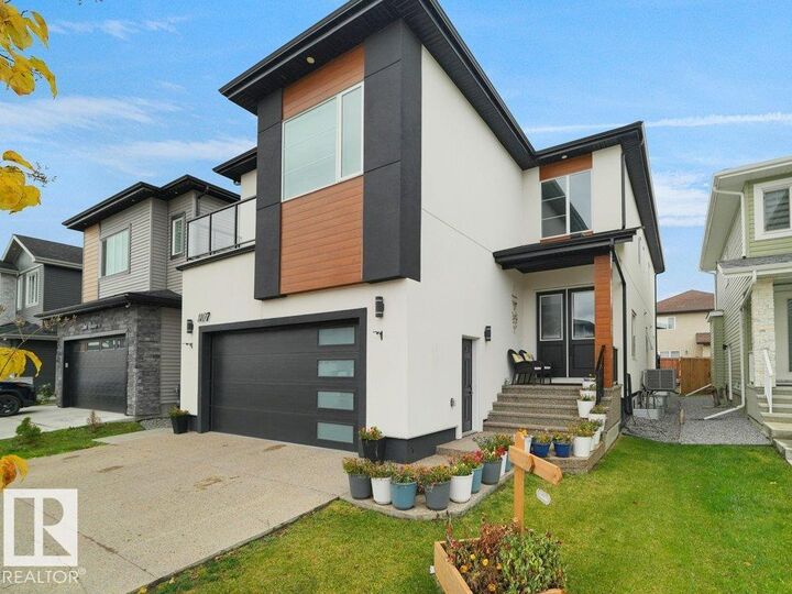 Property Photo:  1107 150 Av NW  AB T5Y 4C1 