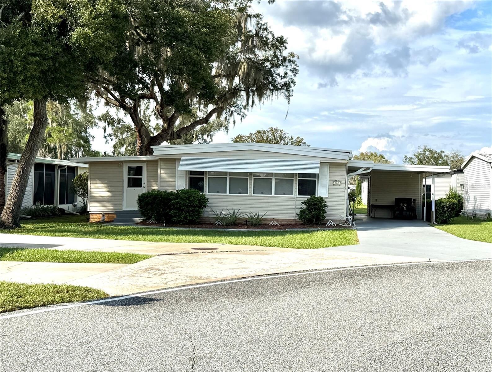 Property Photo:  103 Tamarisk Way  FL 34748 