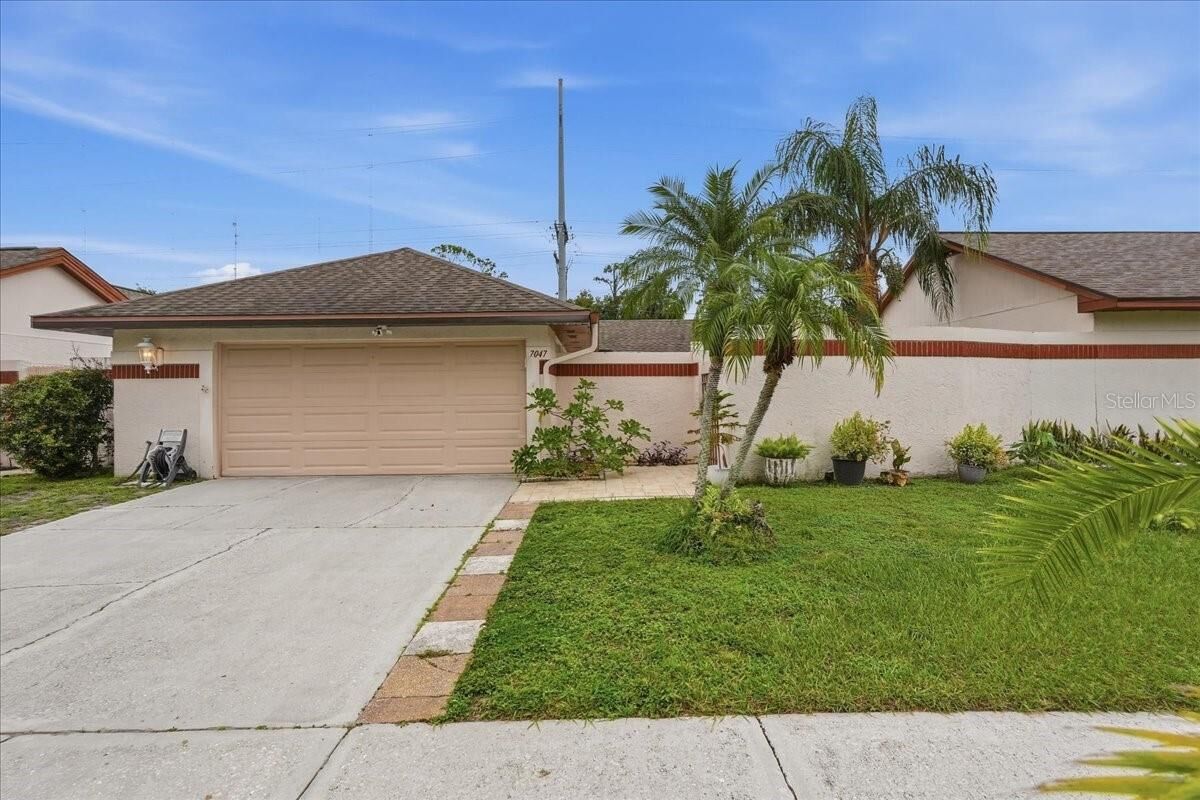 Property Photo:  7047 Silvermill Drive  FL 33635 