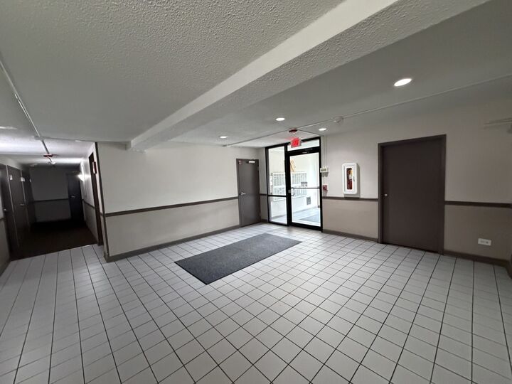 Property Photo:  4500 Beau Monde Drive 204  IL 60532 