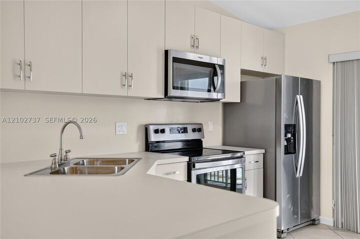 Property Photo:  6989 W 36th Ave 202  FL 33018 