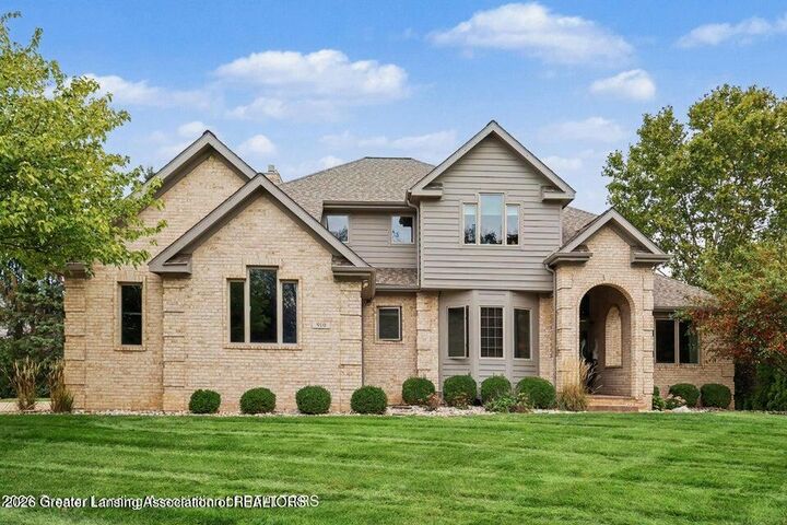 Property Photo:  910 Sandhill Drive  MI 48820 