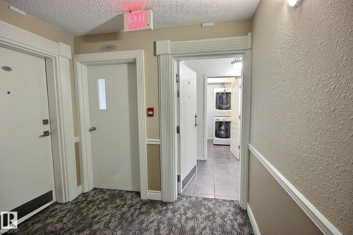 Property Photo:  12838 65 Street NW 218  AB T5A 5H3 