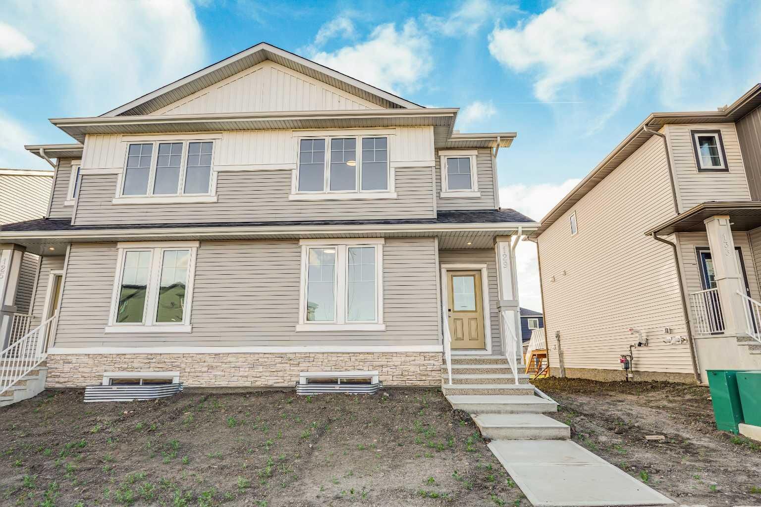 Property Photo:  129 Bridgeport Gate  AB T1X 3E2 