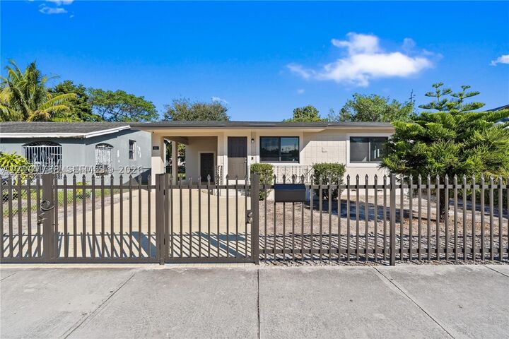Property Photo:  811 NW 115th St  FL 33168 
