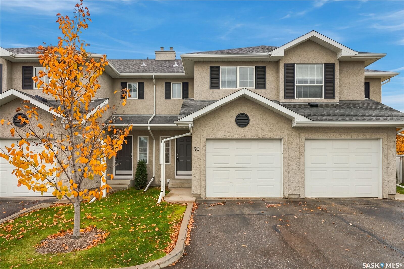 Property Photo:  103 Banyan Crescent 50  SK S7V 1G3 