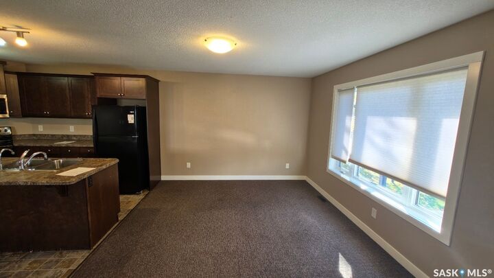 Property Photo: 139 St John Street N SK S4R 2V8