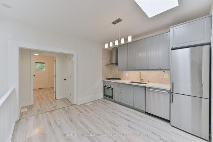 Property Photo:  233 Cedarvale Avenue  ON M4C 4K3 