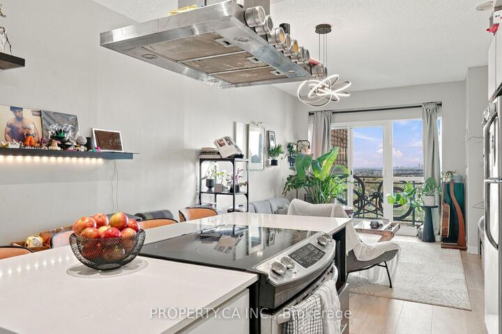 Property Photo:  165 Legion Road 2032  ON M8Y 0B3 