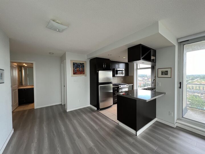 Property Photo:  5068 Kwantlen Street 18xx  BC V6X 4K4 