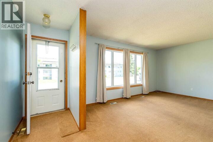 Property Photo:  3408 52 Avenue  AB T9V 1H6 