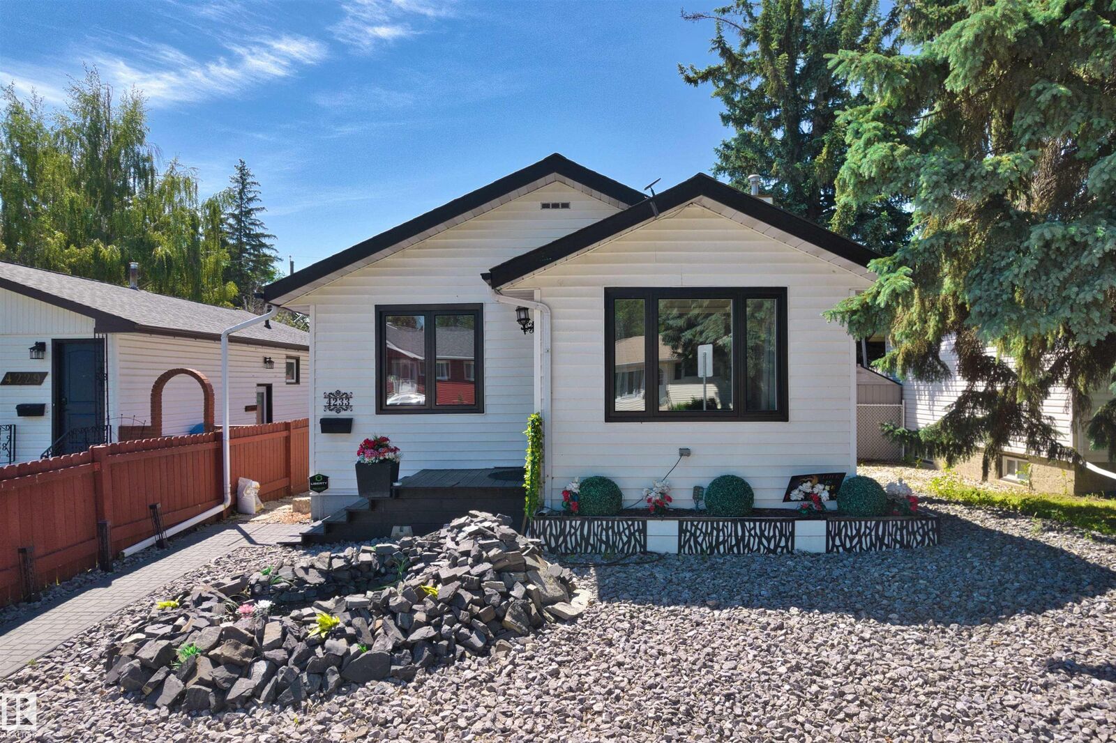 Property Photo:  4233 116 Avenue NW  AB T5W 0W9 